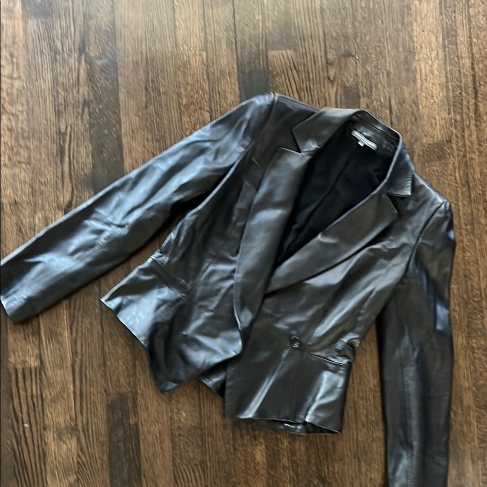Alexander McQueen Black Leather Jacket like new condition. Never worn.